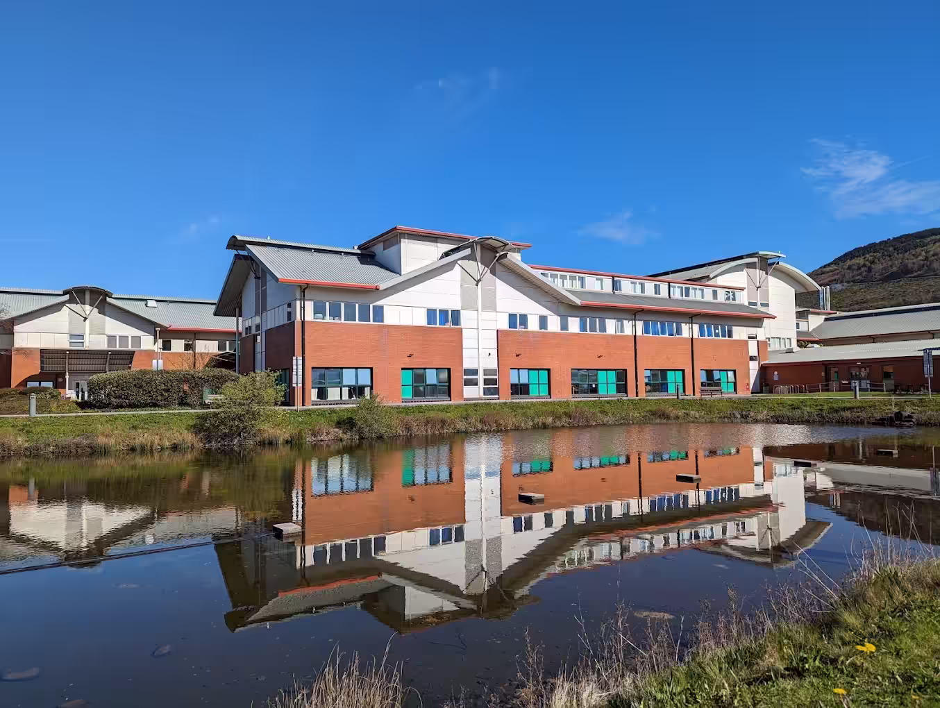 Neath Port Talbot Hospital - Minor Injuries Unit entrance and building exterior. Located in Port Talbot, Wales.